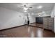 The bedroom features a closet with a large mirror and wood-look tile flooring at 1551 E Glencove St, Mesa, AZ 85203