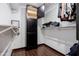 The walk-in closet offers shelves and a cabinet for optimal storage solutions at 1551 E Glencove St, Mesa, AZ 85203