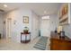 Bright foyer featuring neutral walls, tile flooring, and recessed lighting at 16287 W Willow Creek Ln, Surprise, AZ 85374