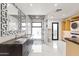 Modern bathroom features double vanities with decorative mirrors, and a glass shower with rainfall shower head at 1861 W Navarro Ave, Mesa, AZ 85202