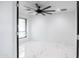 Bright bedroom with marble floors, recessed lighting, and a window with blinds at 1861 W Navarro Ave, Mesa, AZ 85202