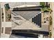 Aerial view shows solar panels, a patio with a fire pit, and a hot tub at 18865 W Mescal St, Surprise, AZ 85388