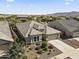 Bird's eye view of home shows a landscaped yard and large driveway at 18865 W Mescal St, Surprise, AZ 85388