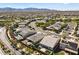 An aerial view showing community with desert landscaping and mountain views at 18865 W Mescal St, Surprise, AZ 85388