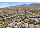 Aerial view shows desert community and mountain views at 18865 W Mescal St, Surprise, AZ 85388