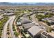 Aerial view of a desert community boasting stunning mountain views in the distance at 18865 W Mescal St, Surprise, AZ 85388