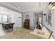 Open living area with modern decor, including a pool table and tray ceilings at 18865 W Mescal St, Surprise, AZ 85388