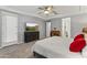 Comfortable main bedroom with carpet, tray ceiling and relaxing decor at 18865 W Mescal St, Surprise, AZ 85388