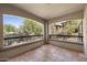Spacious covered balcony with tile floors and great views of the community landscape at 19700 N 76Th St # 1103, Scottsdale, AZ 85255