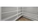 Walk-in pantry with rows of shelves for maximum storage and organization of goods at 19700 N 76Th St # 1103, Scottsdale, AZ 85255