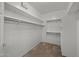 Walk-in closet offering a spacious area for organizing clothing on multiple shelves at 19700 N 76Th St # 1103, Scottsdale, AZ 85255