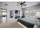 Relaxing main bedroom features a decorative fireplace, entertainment center and lots of natural light at 19700 N 76Th St # 2057, Scottsdale, AZ 85255