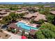 Aerial view of the community pool, lounge chairs and desert landscaping at 20100 N 78Th Pl # 2193, Scottsdale, AZ 85255