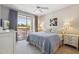 Relaxing bedroom boasts a king-size bed, private balcony, and scenic views for a serene living experience at 20100 N 78Th Pl # 2193, Scottsdale, AZ 85255