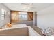 This bedroom features twin beds, barn door accent and bright windows for a tranquil living space at 20100 N 78Th Pl # 2193, Scottsdale, AZ 85255