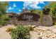 Stone entrance sign for Edge at Grayhawk surrounded by desert landscaping at 20100 N 78Th Pl # 2193, Scottsdale, AZ 85255