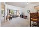 Spacious living room with neutral tones, vaulted ceiling, and a large window for natural light at 20100 N 78Th Pl # 2193, Scottsdale, AZ 85255
