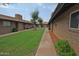 Charming courtyard with mature trees and well-maintained lawns at 2015 E Southern Ave # 23, Tempe, AZ 85282