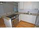 Modern kitchen with granite countertops and stainless steel appliances at 2015 E Southern Ave # 23, Tempe, AZ 85282