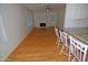 Bright living room with wood flooring and white brick fireplace at 2015 E Southern Ave # 23, Tempe, AZ 85282