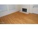 Cozy living room with two windows and a painted brick fireplace at 2015 E Southern Ave # 23, Tempe, AZ 85282