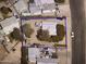 Aerial view of property with trees, street access and a large enclosed perimeter at 20644 N 36Th Ave, Glendale, AZ 85308