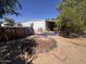 A backyard showcasing an above-ground pool, lush greenery, and a cozy seating area at 20644 N 36Th Ave, Glendale, AZ 85308