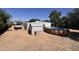 Backyard with above ground pool, storage shed, and gravel landscaping at 20644 N 36Th Ave, Glendale, AZ 85308