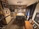 Eat-in dining area with a wooden table set and built-in cabinets at 20644 N 36Th Ave, Glendale, AZ 85308