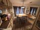 Inviting dining room featuring a wooden table set, carpet, and comfortable space at 20644 N 36Th Ave, Glendale, AZ 85308