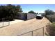 A single story home featuring a metal roof, covered parking and graveled yard at 20644 N 36Th Ave, Glendale, AZ 85308