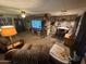 Cozy living room with carpeting and views into the dining and kitchen areas at 20644 N 36Th Ave, Glendale, AZ 85308