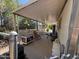 Spacious covered porch with concrete flooring, offering ample space for outdoor enjoyment at 20644 N 36Th Ave, Glendale, AZ 85308