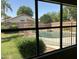 Backyard featuring a pool, landscaping, and greenery at 2092 E Smoke Tree Rd, Gilbert, AZ 85296