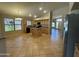 Bright, spacious kitchen with an island and a seamless flow to the entryway, perfect for cooking and entertaining at 2092 E Smoke Tree Rd, Gilbert, AZ 85296