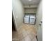 Laundry room with washer, dryer, and built-in shelving at 2092 E Smoke Tree Rd, Gilbert, AZ 85296