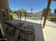 Relaxing patio with lounge chairs offering views of the backyard and pool at 2092 E Smoke Tree Rd, Gilbert, AZ 85296