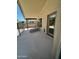 Covered patio features lounge chairs and a private outdoor space with easy access from inside at 2092 E Smoke Tree Rd, Gilbert, AZ 85296