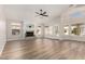 Bright and spacious living room with a fireplace, vaulted ceiling and plenty of natural light at 20961 N 96Th Dr, Peoria, AZ 85382