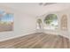 Bright living room with hardwood floors and plenty of natural light at 20961 N 96Th Dr, Peoria, AZ 85382