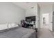 Calming bedroom features grey walls and carpet, and an open doorway at 2438 S Chestnut Pl, Chandler, AZ 85286