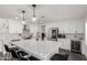 Bright, spacious kitchen with a large island, modern appliances, and sleek white cabinetry at 2438 S Chestnut Pl, Chandler, AZ 85286