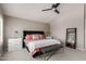 Primary bedroom features a ceiling fan, lots of natural light and neutral colors at 2438 S Chestnut Pl, Chandler, AZ 85286