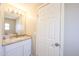 Stylish bathroom featuring a vanity with granite countertop and new lighting at 2650 W Union Hills Dr # 169, Phoenix, AZ 85027
