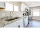 Bright kitchen featuring stainless steel appliances, granite countertops, and modern fixtures at 2650 W Union Hills Dr # 169, Phoenix, AZ 85027