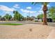 Street view of houses with desert landscaping and palm trees at 2801 E Sunnyside Dr, Phoenix, AZ 85028