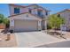 Charming two-story home with a neutral color palette, manicured front yard and attached garage at 3047 S Mandy St, Mesa, AZ 85212