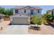 Two-story home with a tile roof, well-manicured landscaping and an attached two car garage at 3047 S Mandy St, Mesa, AZ 85212