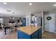 Open kitchen featuring a large butcher block island connecting the living and dining spaces at 3047 S Mandy St, Mesa, AZ 85212