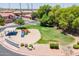Aerial view of neighborhood park with playground, green space, seating area, and mailboxes at 3047 S Mandy St, Mesa, AZ 85212